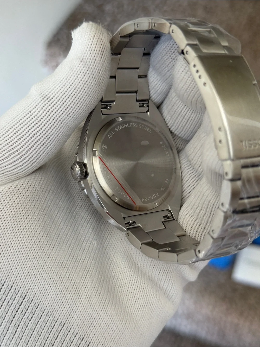 Fossil Men’s Blue Wave Dial Stainless Steel Swim Watch with Black Bezel